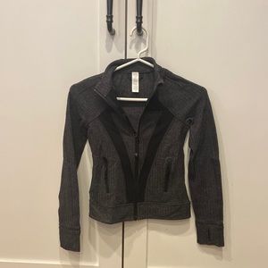 Grey herringbone ivviva zip up sweatshirt. Girl’s size 8.